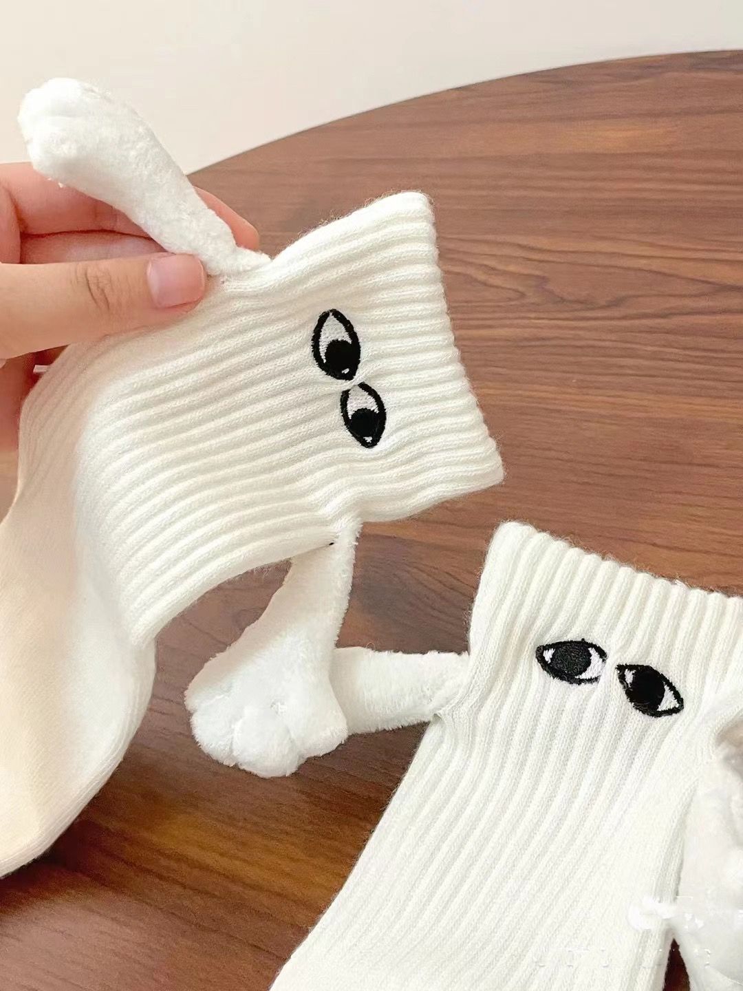 Magnetische Saug-Hand in Hand Socken